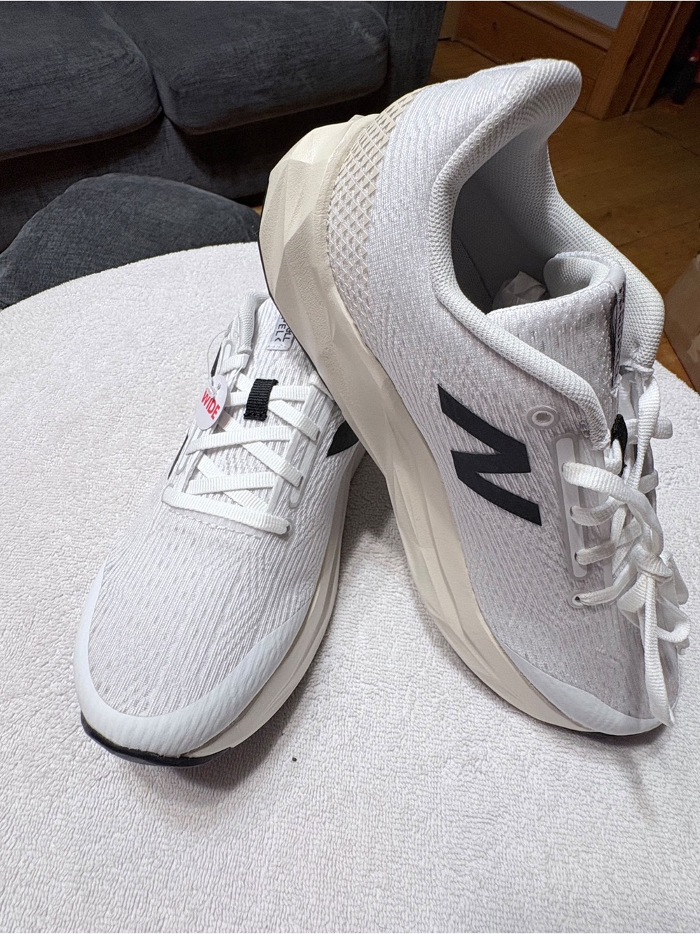 New Balance Men's White Athletic Running Shoes with Black N Logo